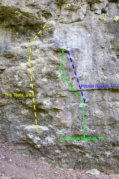 Bouldering on left side of Amusement Wall (right of bouldering cave).