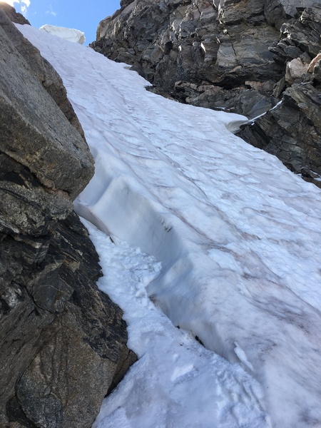 Top-o-route snow steepness on far-right upper couloir, Sept 23 2017. Some ice was found around the sides and at the choke entrance below.