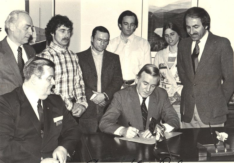 Signing the following document.Top L to R NH Politician.. Rick Wilcox.. Paul Ross.. Bill Kane..Brenda Wilcox.. NH Politician.. Bottom L to R.. NH Politician..NH Politician