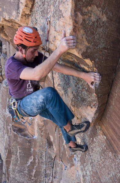 Vitaliy climbs the 10d first pitch.