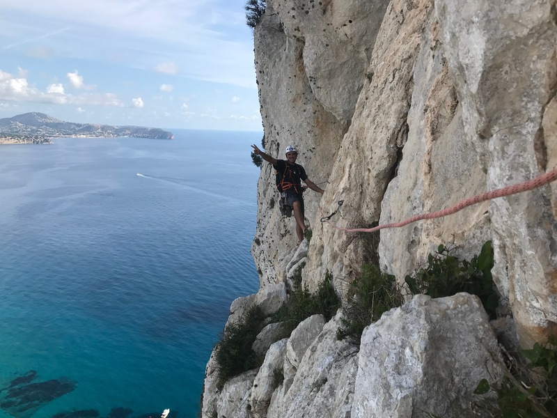 Leader at the belay station at the end of the traverse on Pitch 3.