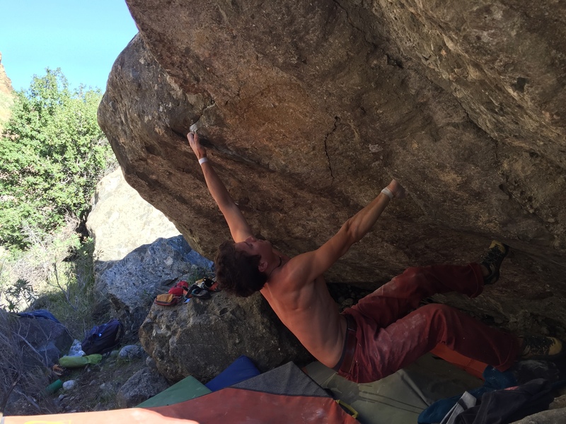 Nick making the first big move to the jug pocket, and debatably the crux move of "Sub Optical"