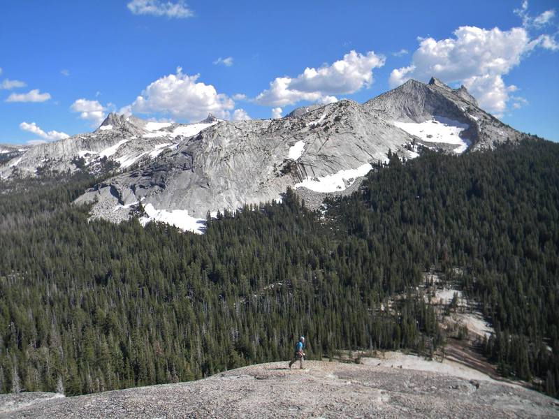 The descent: Hike down the backside - straight towards cathedral peak aiming for that dirt patch down below. Before you get to that though, you'll see the opportunity to make a right and traverse around the dome meeting up with a trail