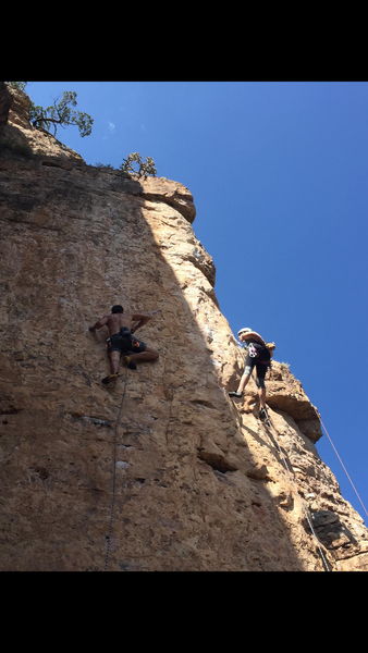 The climber on the left is on "Metropolis," 11d. The climber on the right is on "Miller Time," 11a/b. Both are excellent routes.