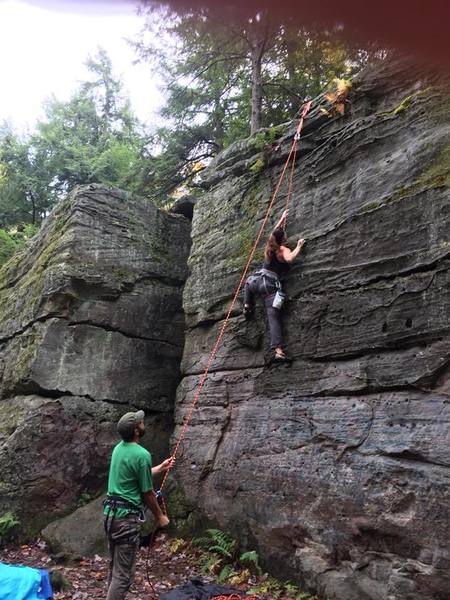Bilger's Rocks, area known as The Kitchen. Lots of short top-rope routes with very fun holds. The more vertical routes probably average 5.8+ and up. Take lots of chalk (it's damp), and lots of long slings for setting up top-ropes. Also, it wouldn't hurt to carry a small wire brush and a larger one for cleaning moss off holds and the face.