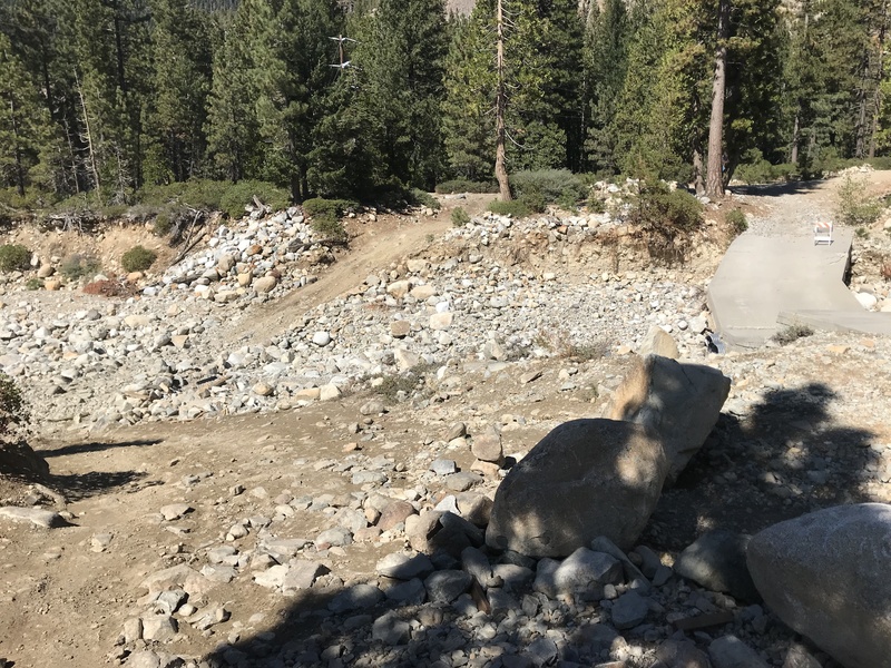 Picture of bridge as of 9/23/17. High clearance 4x4s can go around to the left, but it's more than a "city driver" would be comfortable with.