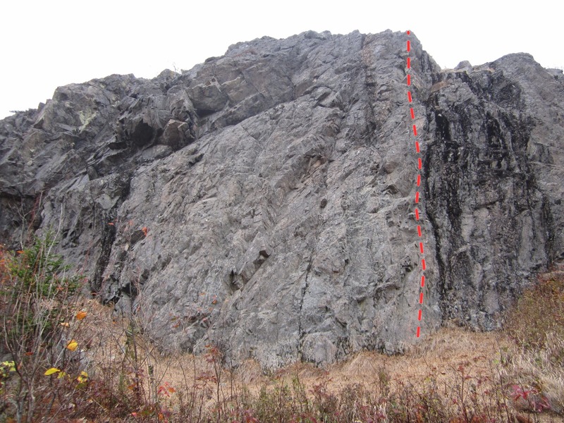 Photo showing right hand side of cliff. Red line is Lunch Break Arete.