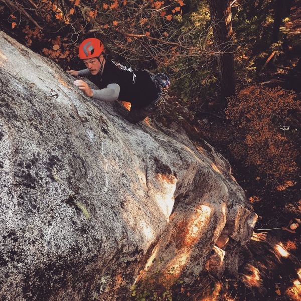 Drew Davidson working the low crux on the FA