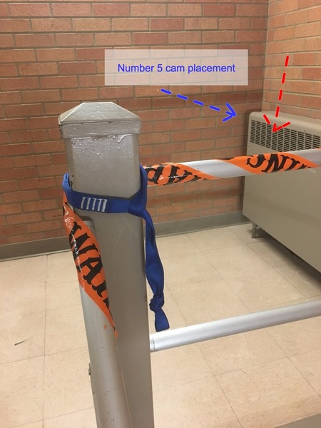The beam has the blue webbing on it, use this as your main anchor point. The other anchor points are just hilarious. The red arrow indicates where the number 1 nut/stopper can go. Only equalize the beam!
