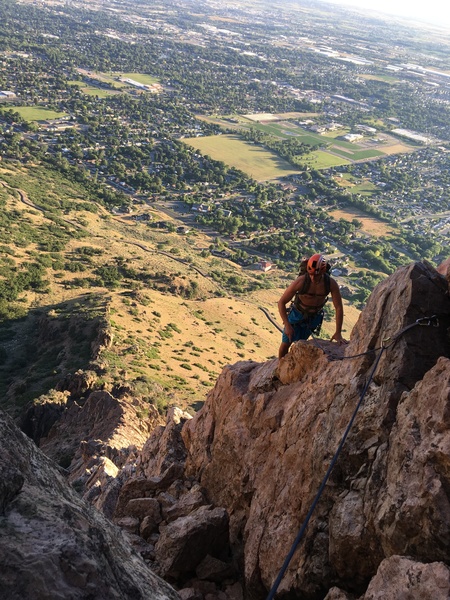Johnny with views of North Ogden below him. Top of P2