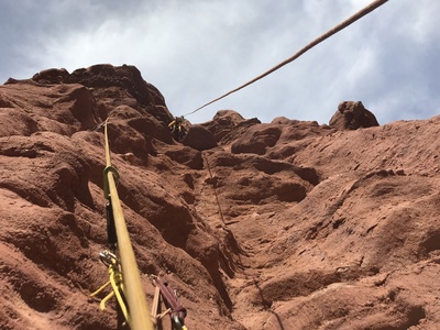Keiko leading the steep pitch 4.