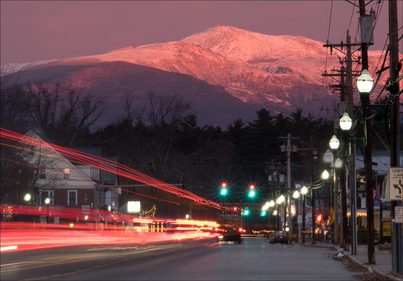 First light on Mt. Washington, as seen from 18 air-miles away in North Conway village.