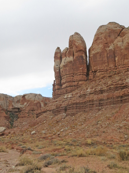 Trident Tower from a distance in the main wash of Roundhouse Canyon.