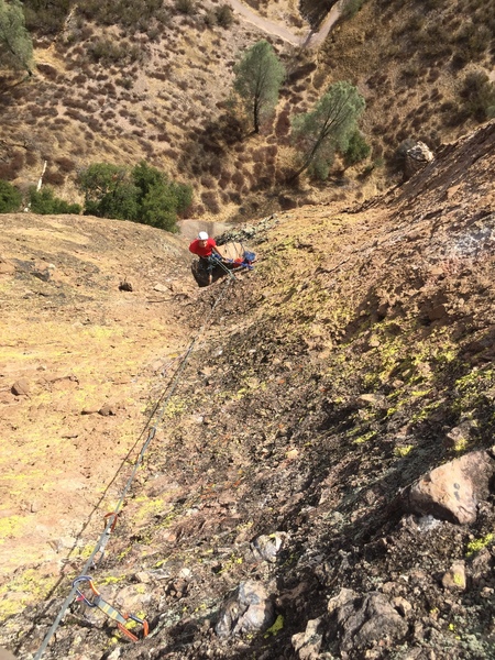 Looking down at the killer P2 belay on top of a HUGE loadstone.
