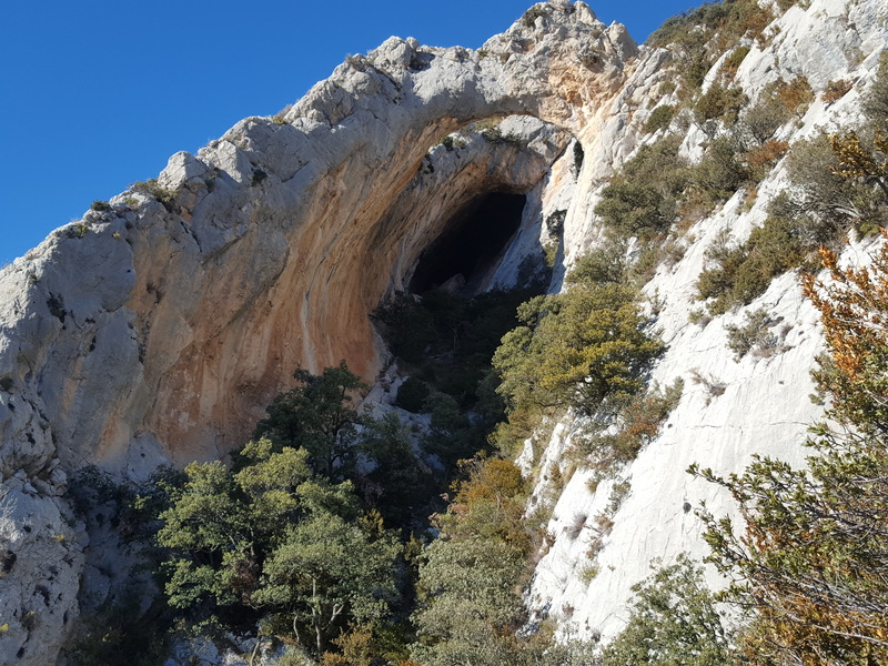 This incredible of you is looking up at the main Arch and Cave at El Forat dels Lladres.”