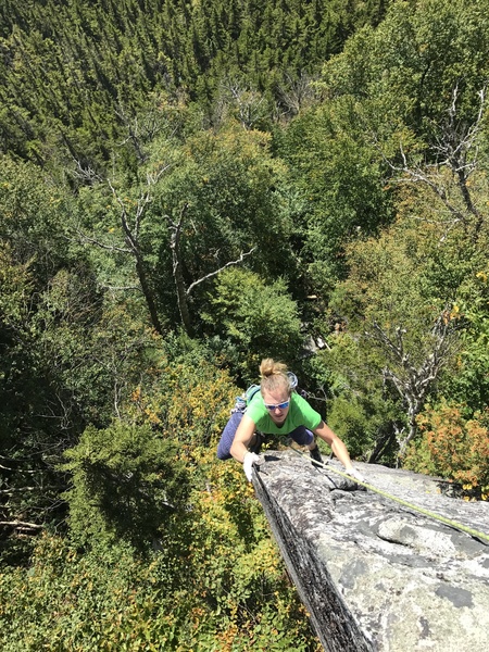 Hope on the top of the airy arete of Wild Black.