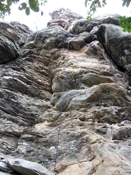 Rope line on Legendary.
<br>
The top slants sightly left through an exposed mini dihedral up the edge of the arete.