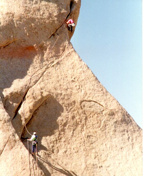 Hans at the overhang traverse mantel crux on Trac II, FUN!