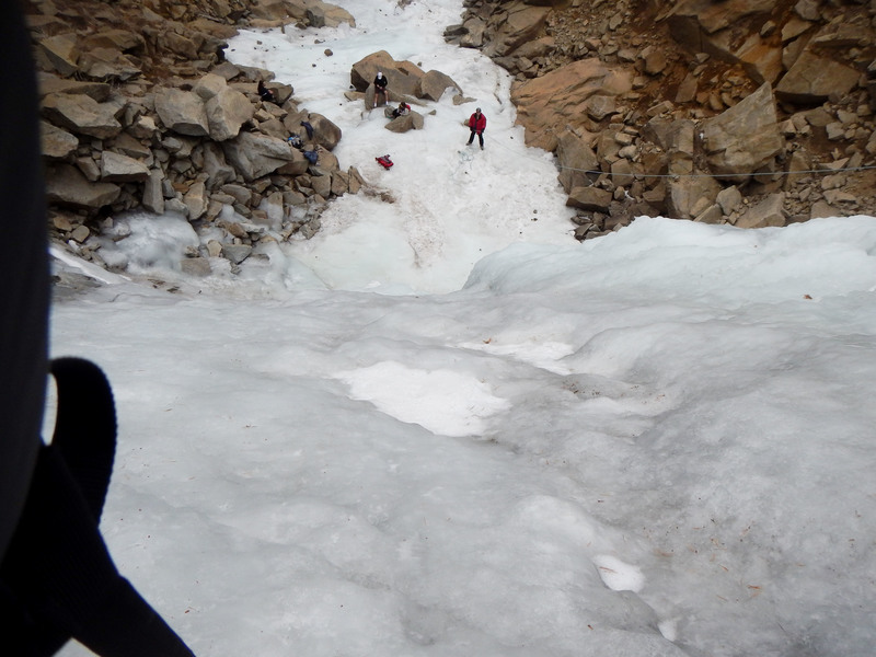 Looking down at the base of the falls from halfway up. On this day January 3, 2018, the road and trail were mostly dry. A steady stream of hikers came up to view the falls.