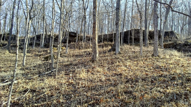 This is the first set of good boulders you'll come to on the Mooner's Hollow Trail. Containing "Just a Little Lie" and other projects.