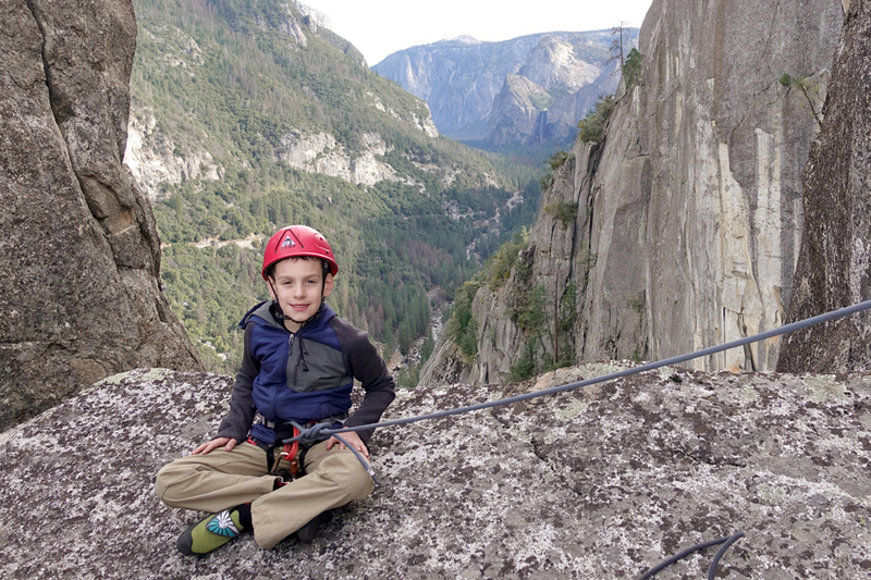 Wesley (just 8 years old), poses in the Notch on the Rostrum, Yosemite.