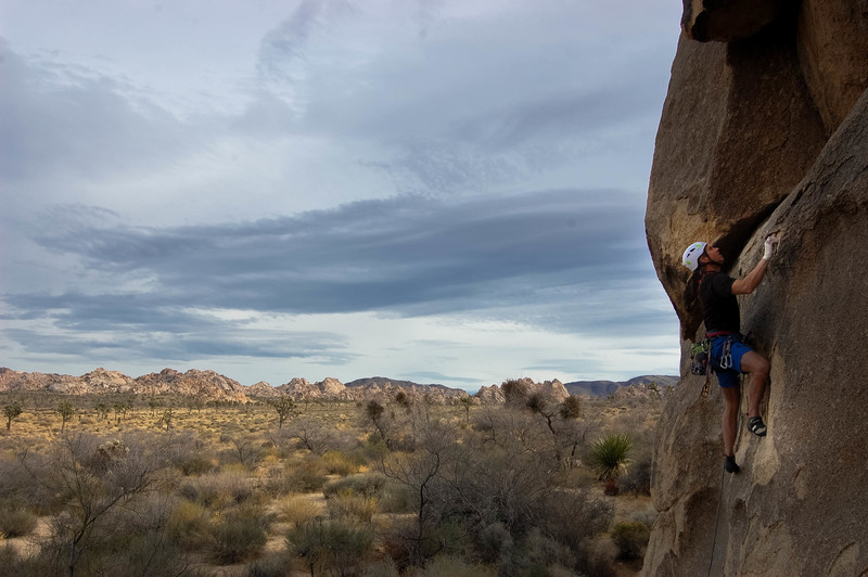 Mark leading Left Baskerville with moody skies