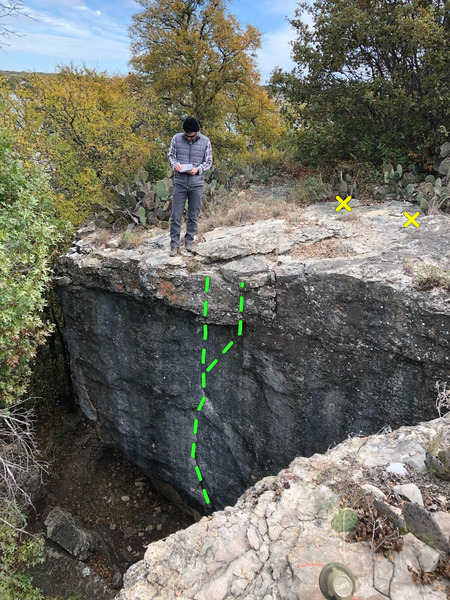 Standing above The Mangler, looking at heart rock. Bolts are 10' back and finish can be straight over or right.