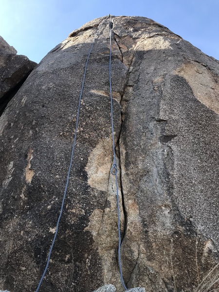 Route shown here. Up hill and NW of fear rock. The crack is very obvious when standing on top of FR.