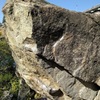 Right side of main boulder.