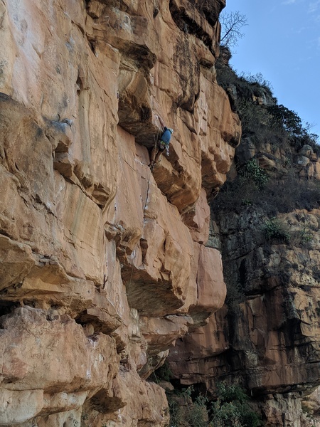 Ryan climbing the route