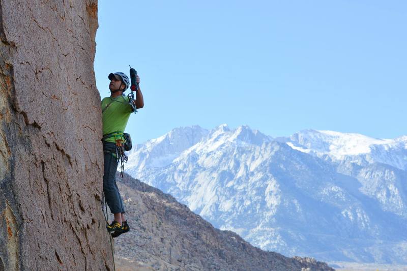 Dave Daly putting in the stainless steel during the FA of 'Shit Howdy' (5.9). Photo credits Mungeclimber