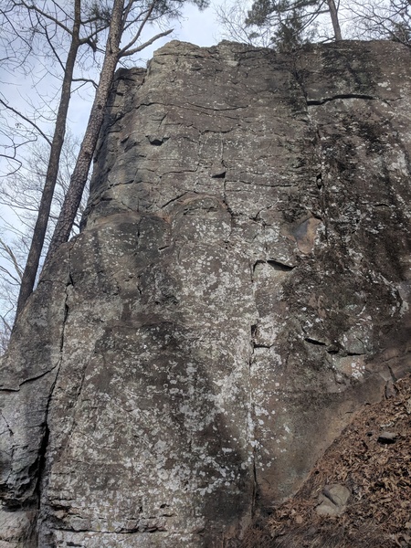 Climb the face just right of the arete