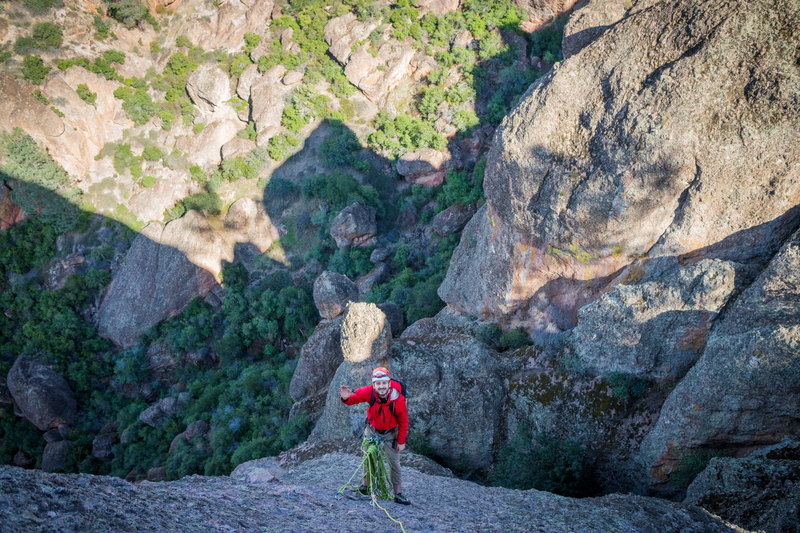 Photo of my friend on the hanging belay at the end of P2 as I lead P3.