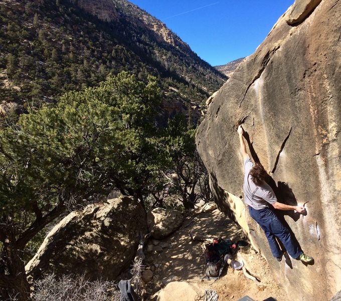 Zach moving to the pocket on this amazing boulder