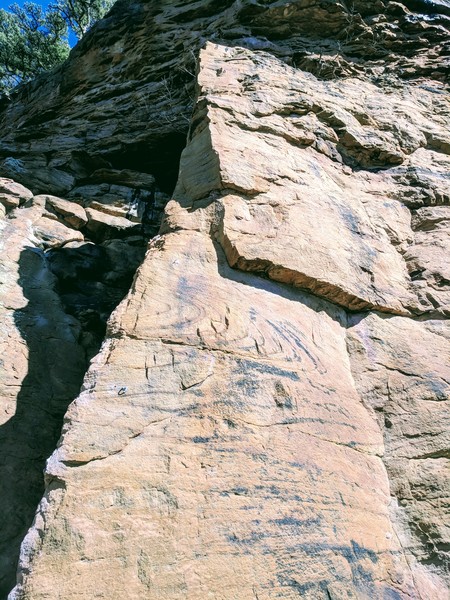 Start on the left side of the arete and make your way up to the anchors just below the massive ledge.