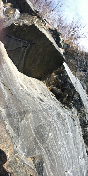 From the ground, it looks like there is a huge ledge / cave to hang out in, but when you get up there, it is just an uncomfortable slab.