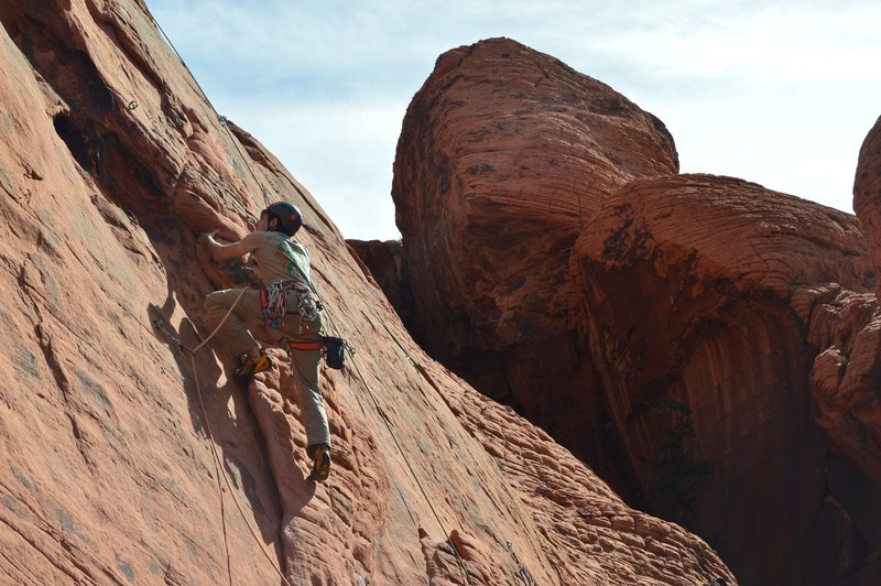 Alex's first lead--headed to second bolt above and left of large unstable flake.