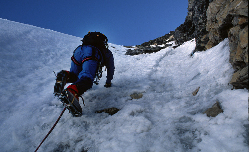Dale Navish above the Hourglass By-Pass Couloir as we move onto the snow/ice face that leads to the Kain Shoulder - August 1988