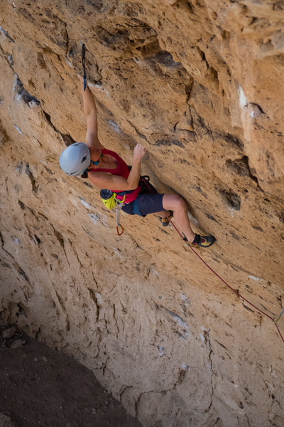 Making the final move to the jugs after the crux. March 2018.