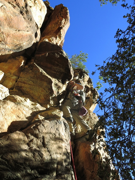 The climb starts in a dry wash where 2 crack systems join about 60 feet up. Rope drag is an issue.