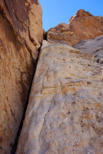 Crack variation to the left of the bolt on Pitch 5.