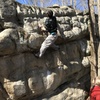 A New River Gorge local demonstrating perfect technique and fashion sense on this classic v3 warmup.