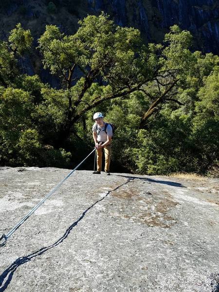 Robert rappelling the upper part of the slab.