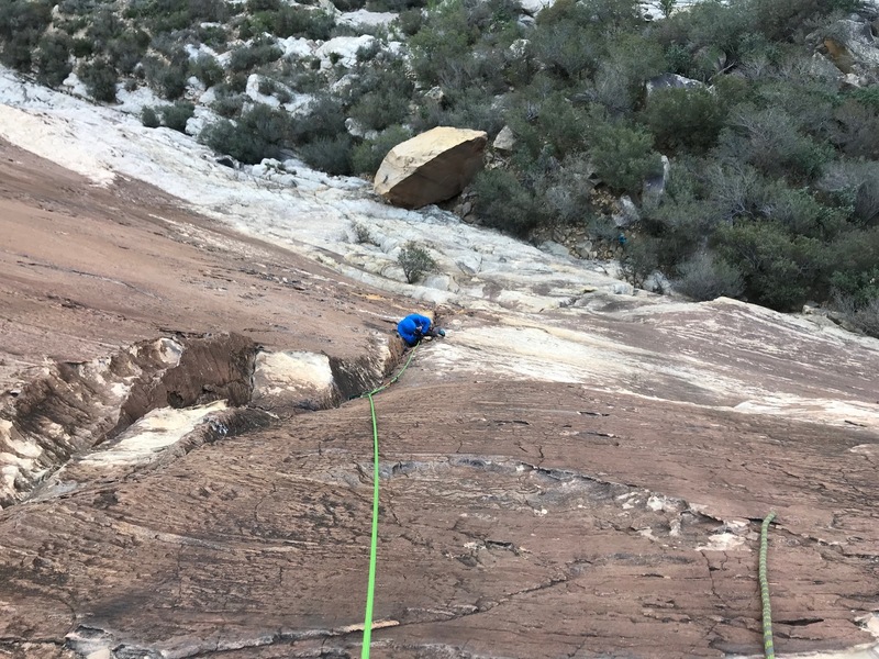 Alec cleaning my zipped up gear through 5.9 crux of P1