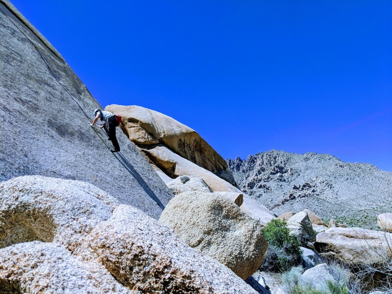 Emily near the 2nd bolt on Suicidal Maniac.