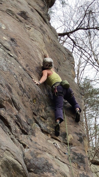 Erica pulling out some fancy beta to make the reach