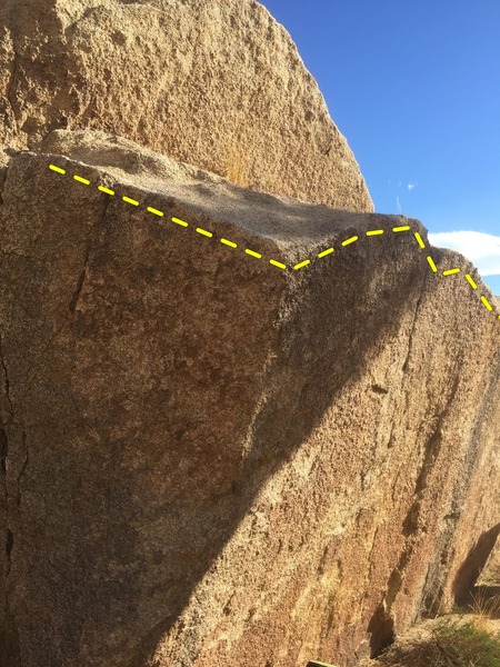 The start of the traverse (left most edge), the first corner to round (middle), and the longer side of the boulder (right).
