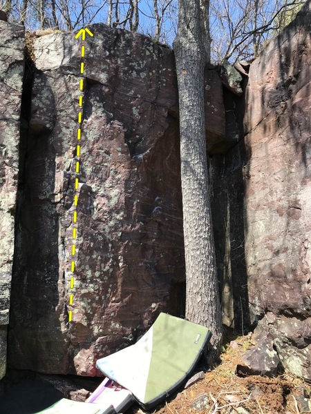 The left problem on the blunt arete.