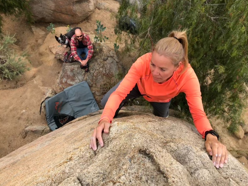Agina Sedler as Nathan Fitzhugh and Scout watch at the Lower Exit Road Boulders.