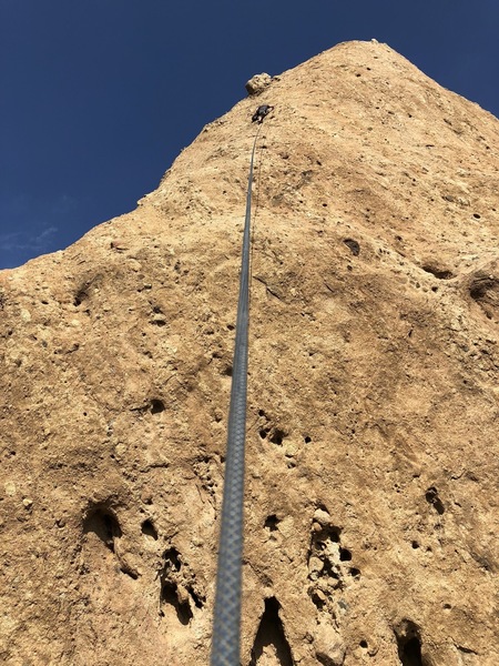 Taylor getting ready to clean the anchors of Dixieland. The route wanders to the left as the start is way to the right near the arete.